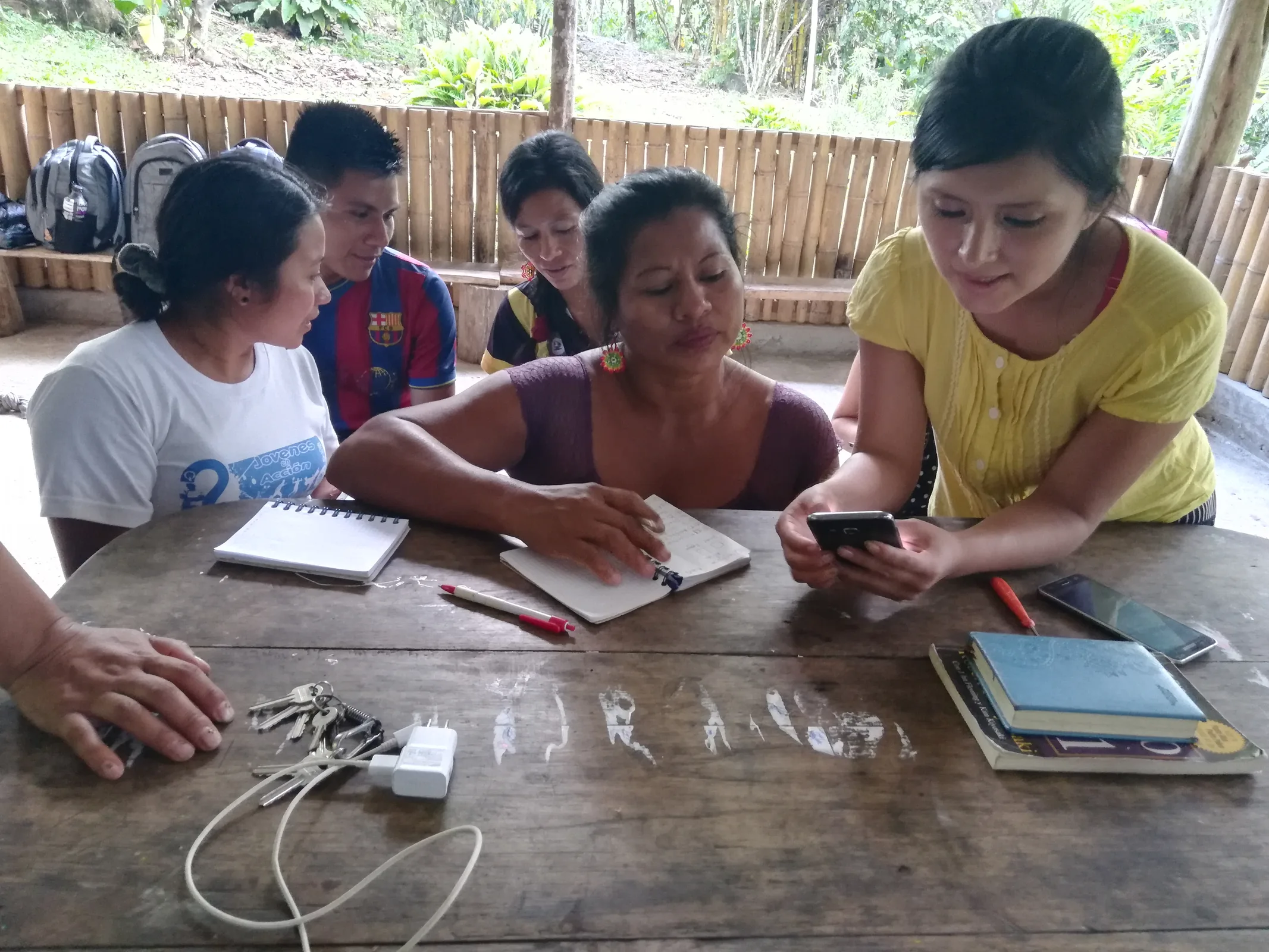 Community members working together in the Ecuadorian Amazon