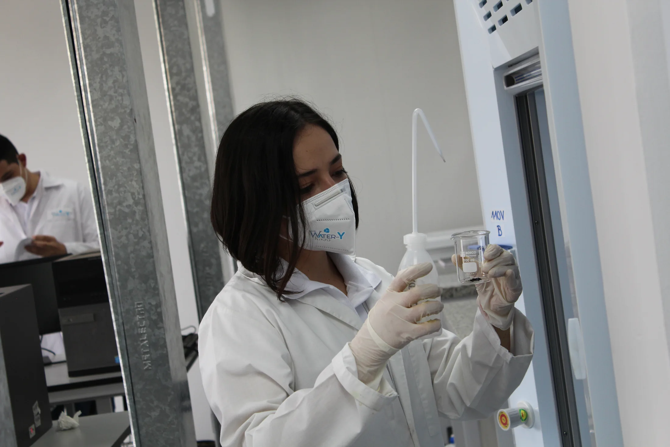 Water-Y researcher working with a laboratory sample